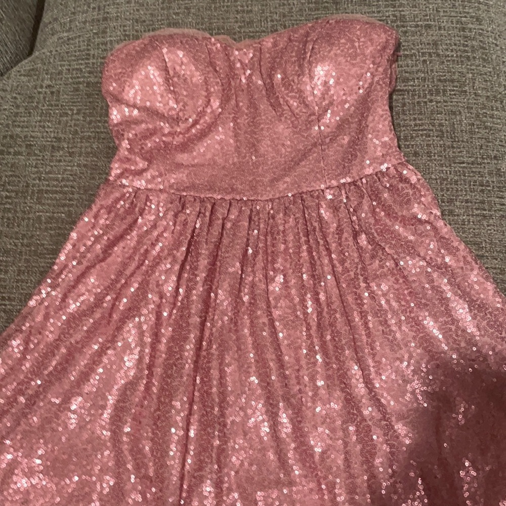 Pink sequin mini dress.